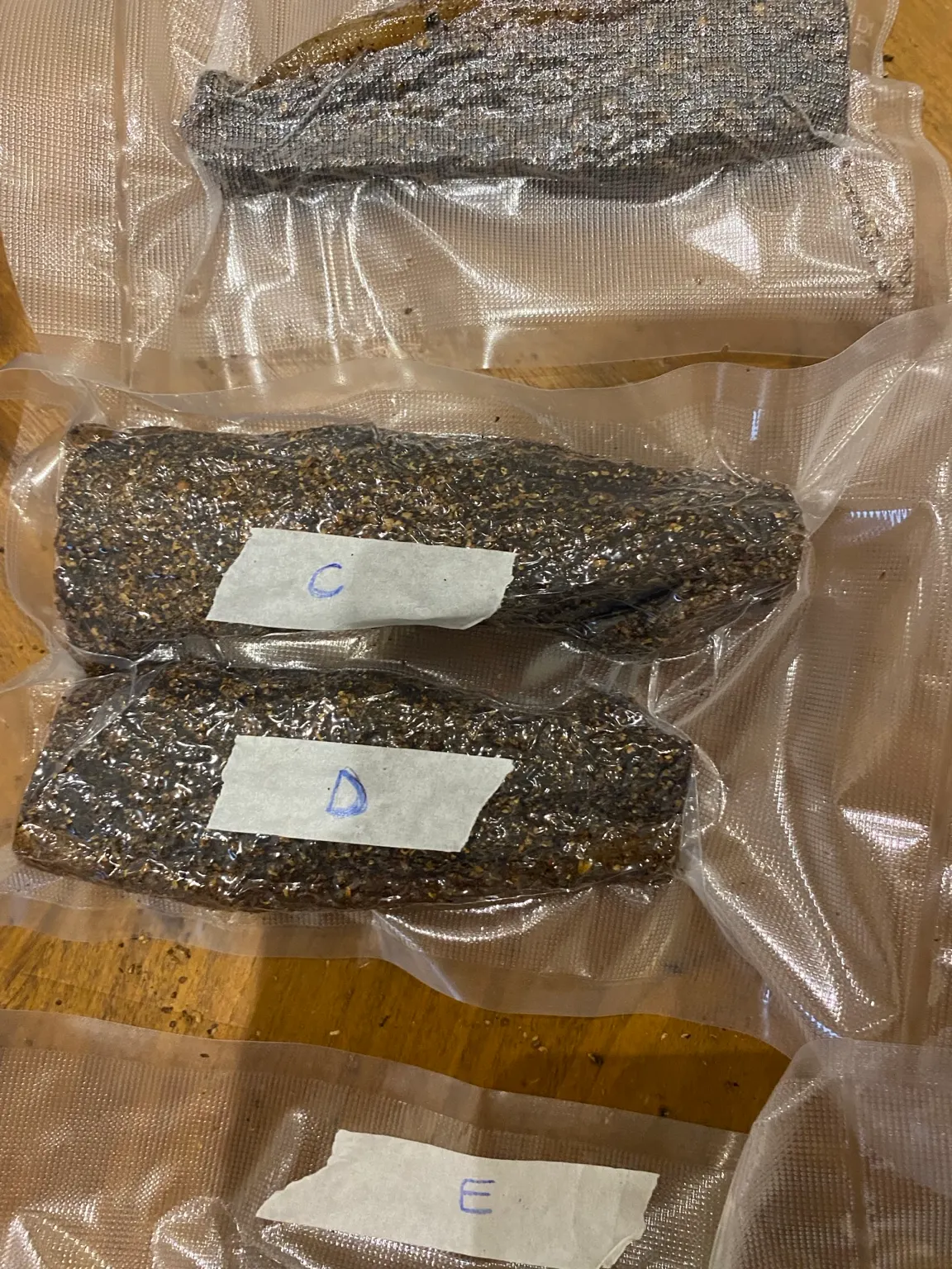 Vacuum-packed pieces with visible handwritten labels